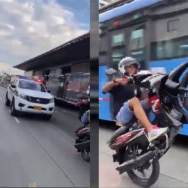¡Nada pasó! Motociclista se paseó por carril del MÍO haciendo piruetas frente a la Policía