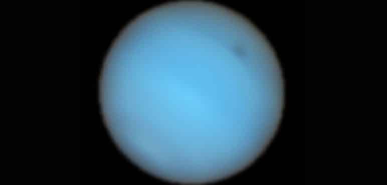 Detectan por primera vez desde la Tierra una mancha oscura en Neptuno