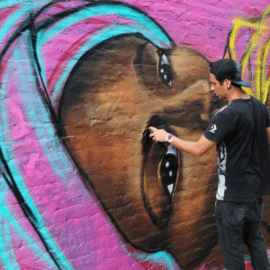 Artistas se tomarán la Calle 5ta: Transformarán los murales del sector